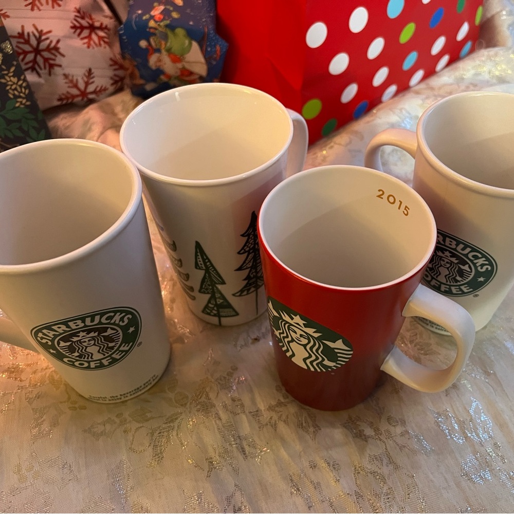 4 Starbucks mugs years 2006 and 2015